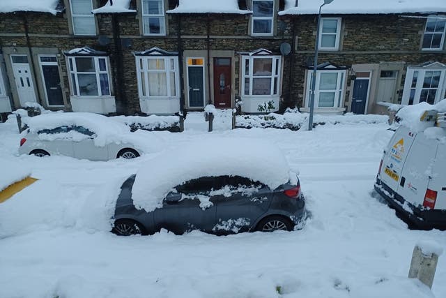 <p>A snow-covered street in Cumbria, UK</p>